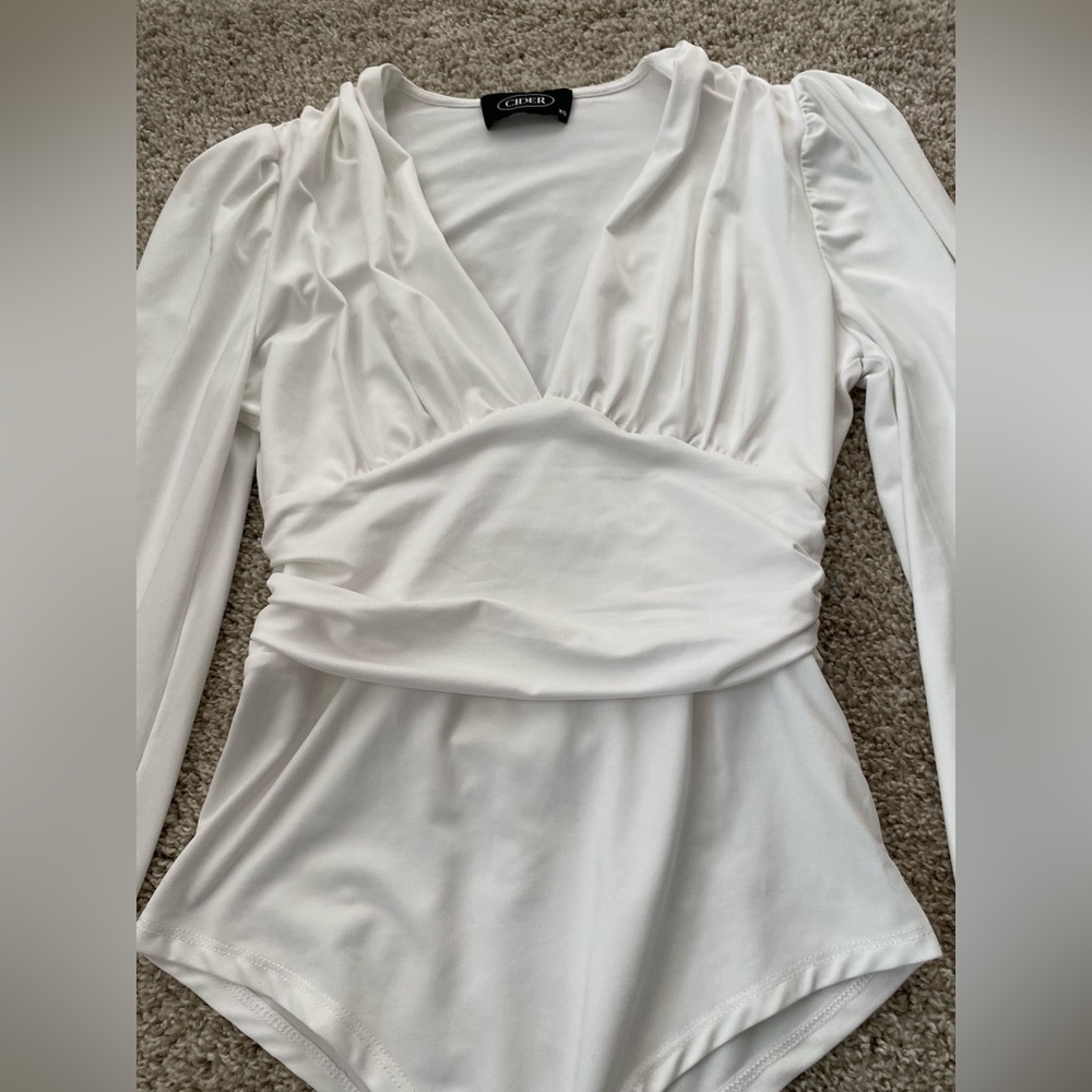 White lowcut bodysuit